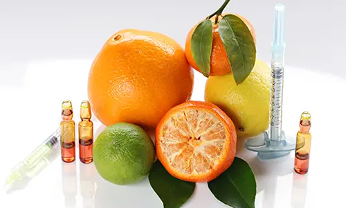 Vitamin Shots with Vitamin C Oranges